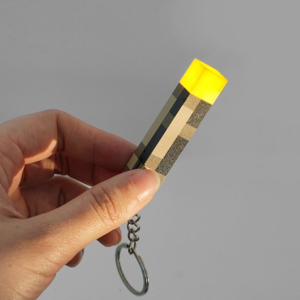 Pixel Torch Light Keychain – Battery Powered LED Mini Gadget for Fans!